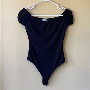 Anthropologie Mocking Jay Black Bodysuit